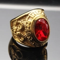 Macro shot of a vintage gold-plated men's ring featuring a large red oval gemstone and ornate carvings - Size 7 / Retro Relief School Ring Style (Gold Style 4) / Gold (Red Stone)