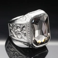 Macro shot of men's vintage steel ring with large rectangular grey gemstone and engraving - Size 7 / Steel Color Mineral Black Gemstone