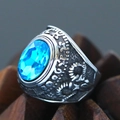 Macro detail of vintage punk ring featuring a large oval blue gemstone and embossed texture - Size 7 / Ethnic Rugged Relief Style (Steel Style 29) / Silver (Bright Blue Gemstone)