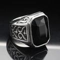 Macro shot of men's vintage steel ring featuring a large rectangular black gemstone inlay - Size 7 / Vintage Silver Black Gemstone