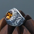 Macro shot of punk retro steel ring featuring amber gemstone and All-Seeing Eye engraving - Size 7 / All-Seeing Eye Relief BOROBUDUR Style (Steel Style 17) / Black Silver (Amber Gemstone)