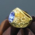 Macro view of vintage gold punk ring with large faceted purple gemstone and relief details - Size 7 / Retro Mechanical Industrial Relief Style (Gold Style 19) / Gold (Purple Stones)