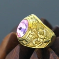 Macro detail of golden high school 2022 class ring with pink gemstone and relief carvings - Size 7 / 2022 High School Graduation Commemorative Style (Gold Style 18) / Gold