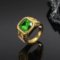 Detailed macro view of vintage gold ring featuring a green square gemstone and embossed band - Gold Olive Green Zirconia