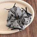 Detail of gray checkered heart pattern scrunchie with bows in a decorative tray - Heart Polka Dot Bow - Grey