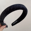 Detail of a handmade black velvet padded headband featuring a retro thick sponge design - Headband / Black