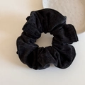 Close-up of black velvet scrunchie with structured piping on a white ceramic tray - Hair Tie / Black