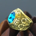 Retro punk gold steel ring featuring a large oval blue gemstone and embossed patterns - Size 7 / Relief Number 1006 Style (Gold Style 26) / Gold (Dark Blue Gemstone)