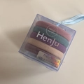 Detail of 5 high-elasticity seamless hair ties in Morandi tones inside a square gift box - Plain Morandi