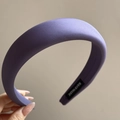 Detail of purple fabric headband featuring a woven texture and HANDMADE label tag - Padded Satin Headband / Purple