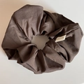 Detail of coffee brown oversized scrunchie with pleated texture and Hand Made label - Scrunchie / Coffee