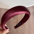 Detail of burgundy satin headband featuring a black hand made label and silky texture - Thick Headband / Burgundy