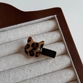 Detailed close-up of leopard cat hair clip featuring France Handmade gold lettering - Light Cat / Duckbill Hair Clips