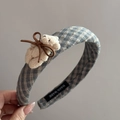 Detail of grey plaid headband featuring a plush bear and handmade interior label - Grey Plaid Headband