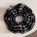 Close-up of black and white striped silk scrunchie with uniform pleats on white background - Accordion Pleated Style / Black Striped Ruffle Scrunchie