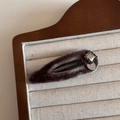 Detail of brown velvet BB clip with square rhinestone and silver metal logo tag - Square Rhinestone Velvet Coffee Hollow / Coffee