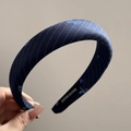 Detail of navy blue twill headband with butterfly patterns and handmade inner label - Navy Blue