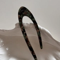 Detail of U-shaped acetate hair pin with dark tortoiseshell pattern and small rhinestones - Dark Green Brown Tortoise