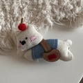 Detail of plush cream bear hair clip with red cherry decor and denim outfit texture - Funny White Puppy - Lying Duckbill Clip