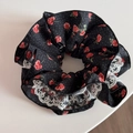 Detail of floral scrunchie with red roses, white dots and delicate lace trim edge - Black Rose With Lace