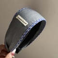Handmade grey fabric scrunchie headband featuring blue checkered trim and woven label - Gray Fabric Blue Plaid Wide Headband