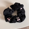 Detail of black hollow floral embroidery scrunchie with pink cherry patterns - Black Cherry Hair Tie