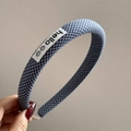 Close-up of blue gingham fabric headband with hello label and smiling face icons - Hello Fine Plaid Style (FQ881417)