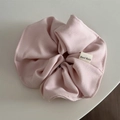 Close-up of pink scrunchie with twill texture and Hand Made fabric label detail - Candy Series Hair Tie - Light Pink