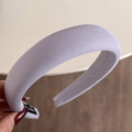Close-up of light purple sponge headband featuring fine ribbed knit texture and soft volume - Candy Series Headband - Light Purple