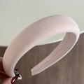 Close-up of pink sponge headband showing the ribbed fabric texture and soft rounded design - Candy Series Headband - Light Pink