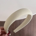 Close-up of beige padded sponge headband featuring a thick design and textured fabric - Candy Series Headband - Yellow