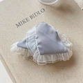 Detail of light blue satin hair clips with delicate white lace trim and elegant ruffles - Blue Hair Claw