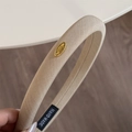 Beige fabric wide headband featuring a gold metal brand tag and hand-made label - 2 cm / Apricot Beige