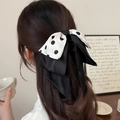 Elegante pinza para el pelo con lazo grande a lunares blancos y negros para mujer - Estilo de Lunares Crema