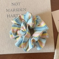Detail of colorful striped double-layer scrunchie with soft ribbed knit texture - Blue Yellow Striped