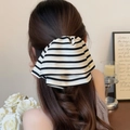 Elegant black and white striped bow hair clip with gold metal emblem detail for women - Off-White Striped Ponytail Clip
