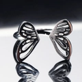 Anello aperto con ali di farfalla in acciaio inossidabile e design traforato - US 6 / Color Acciaio