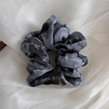 Macro shot of silk satin scrunchie with Chinese ink wash tie-dye and glossy texture - Dark Blue