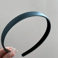 Detailed view of the dark green matte satin headband with a smooth minimalist texture - Slim Thin Style / Blue