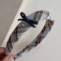 Detail of blue plaid fabric headband with a denim bow and a golden 'love' metal plate - Blue Plaid Dark Blue Headband