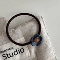 Eleganter Blumen-Haargummi mit grauem Marmor-Resin und orangefarbenem Perlenzentrum - Haargummi / Dunkles Blaugrün