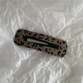 Detailed view of leopard print fabric hair clip with fine hand-stitched edges and metal clip - Coffee Leopard Rectangle