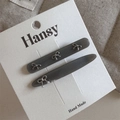 Detail of grey bow hair clips on display card showing silver alloy and bead accents - Silver Bow Gray Style