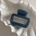 Detailed close-up of a blue hollow rectangle hair claw with delicate red dot accents - Mist Blue Red Dot (Large Square)