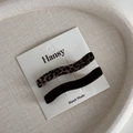 Detailansicht der gewellten Haarklammern mit Leopardenmuster und in Dunkelbraun - Kaffee Leopard Welle