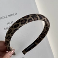Detail shot of leopard print headband with handmade label and high-crown textured fabric - Narrow Headband / Apricot Leopard