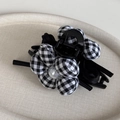Detail of checkered fabric flower hair claw clip with large pearl and silk bow decoration - Black and White Plaid Flower - Hair Claw