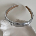Close-up of silver sponge headband with metallic floral accents and non-slip velvet lining - Leather Bow Headband / Silver