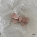Sweet pink resin bow hair clip with 5x3cm dimensions and glossy smooth finish - Bow / Pink Cream