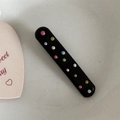 Close-up of black rectangular hair clip with colorful matte polka dot pattern detail - Black Thick Straight